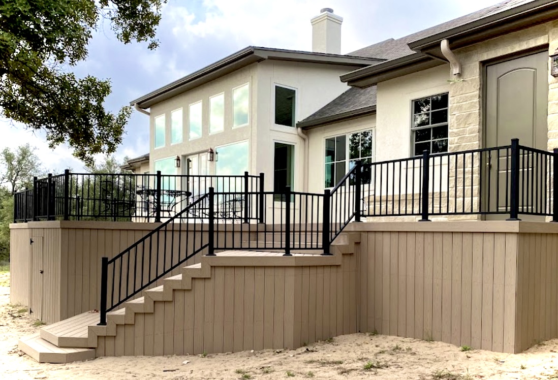 Composite deck with metal railing